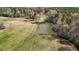 Scenic view of a pond on a property featuring a kayak at 23901 Nc-902, Bennett, NC 27208