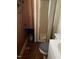 A quaint bathroom showcasing brick floors and a shower at 249 Bailey'S Crossroads Rd, Benson, NC 27504