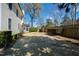 Expansive backyard showing off the lush green lawn and privacy offered by mature trees and manicured hedges at 2704 St Marys St, Raleigh, NC 27609