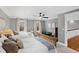 Bedroom featuring twin beds and a view of the outdoors through bright windows at 2704 St Marys St, Raleigh, NC 27609