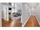 Spacious living room with high ceilings, a fireplace, hardwood floors, and a comfortable seating area at 2704 St Marys St, Raleigh, NC 27609