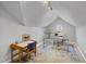 Bright office with round window, desk and chair in neutral tones at 2704 St Marys St, Raleigh, NC 27609