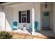 Inviting front porch featuring stylish seating and charming details, perfect for relaxing outdoors at 302 Weaver Ridge Rd, Rougemont, NC 27572