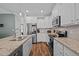 Modern kitchen with stainless steel appliances, granite countertops, and ample cabinet space at 302 Weaver Ridge Rd, Rougemont, NC 27572