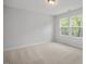 Bedroom featuring neutral carpet, natural light and a bright and airy feel at 303 Old Fashioned Way, Lillington, NC 27546