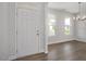 Welcoming entryway with natural light and view to front yard at 303 Old Fashioned Way, Lillington, NC 27546