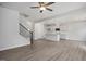 Open-concept living room with hardwood floors, and contemporary fixtures at 303 Old Fashioned Way, Lillington, NC 27546