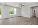 Spacious main bedroom with a private ensuite and large windows overlooking nature at 303 Old Fashioned Way, Lillington, NC 27546