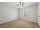 Bedroom featuring a window with blinds, neutral walls, and carpet flooring at 325 Cobblestone Dr, Spring Lake, NC 28390