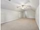 Versatile bonus room with neutral carpet, a ceiling fan, and ample space for various activities at 325 Cobblestone Dr, Spring Lake, NC 28390