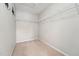 Spacious walk-in closet with ample hanging space and carpeting offers organized storage at 325 Cobblestone Dr, Spring Lake, NC 28390
