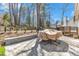 Brick patio space features a table, perfect for entertaining and outdoor dining at 3428 Singleleaf Ln, Raleigh, NC 27616