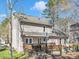 Two-story home featuring a wooden deck and backyard space at 3428 Singleleaf Ln, Raleigh, NC 27616