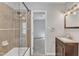 Bathroom featuring a single vanity and shower with glass door at 3428 Singleleaf Ln, Raleigh, NC 27616