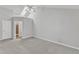 Spacious bedroom with a ceiling fan and a skylight providing natural light at 3428 Singleleaf Ln, Raleigh, NC 27616