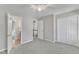 Bedroom with a closet and doorways that lead to other rooms at 3428 Singleleaf Ln, Raleigh, NC 27616