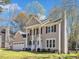 Charming two-story home with a well-manicured lawn, attached two car garage, and welcoming front porch at 3428 Singleleaf Ln, Raleigh, NC 27616