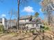 Beautiful view of the house, deck, patio and landscaping at 3428 Singleleaf Ln, Raleigh, NC 27616