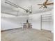 Spacious two car garage complete with storage shelving and overhead fans at 3428 Singleleaf Ln, Raleigh, NC 27616