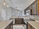Spacious kitchen with stainless steel appliances, tile backsplash, and a central island at 3428 Singleleaf Ln, Raleigh, NC 27616