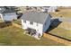 Aerial view of the home showcasing the fenced backyard and outdoor living space at 35 Wolf Ridge Ct, Willow Springs, NC 27592