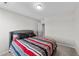 Bedroom offers carpeting and neutral walls, flooded with natural light from the window at 35 Wolf Ridge Ct, Willow Springs, NC 27592