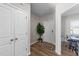 Bright foyer features hardwood floors, closet, and view of an office at 35 Wolf Ridge Ct, Willow Springs, NC 27592