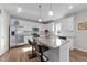 Modern kitchen featuring granite countertops, stainless steel appliances, and a center island at 35 Wolf Ridge Ct, Willow Springs, NC 27592
