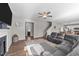 Open concept living room flows into dining area with cozy fireplace at 35 Wolf Ridge Ct, Willow Springs, NC 27592