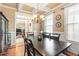 Elegant dining room featuring hardwood floors and large windows for plenty of natural light at 3504 Griffice Mill Rd, Raleigh, NC 27610