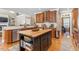 Spacious kitchen with custom cabinets, granite countertops, and stainless steel appliances at 3504 Griffice Mill Rd, Raleigh, NC 27610