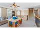Bright loft area with study table, and comfortable seating offers a versatile living space at 3504 Griffice Mill Rd, Raleigh, NC 27610
