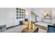 Stylish living room featuring unique vinyl record wall art and modern decor at 414 Rowe Way, Knightdale, NC 27545