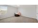 Bright bedroom features a window letting in natural light, neutral walls, and carpet flooring at 417 Sapphire Rd, Burlington, NC 27215