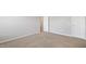 Bedroom features neutral walls and carpet flooring with a white door at 417 Sapphire Rd, Burlington, NC 27215