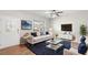 Bright living room featuring modern furniture, a large window, and stylish decor at 417 Sapphire Rd, Burlington, NC 27215