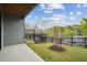 Outdoor patio with fenced in yard and trees at 4720 Cypress Tree Ln, Raleigh, NC 27612
