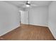 A clean, minimalist bedroom with hardwood floors and a bright, airy feel, ready for personalization at 48 Delmar Ct, Fuquay Varina, NC 27526