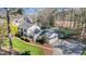 Aerial view of a landscaped property with an in-ground pool, and outdoor seating area at 509 Queensferry Rd, Cary, NC 27511