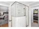 Bright bathroom with glass-enclosed shower featuring sleek tile and modern fixtures at 509 Queensferry Rd, Cary, NC 27511