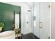 Modern bathroom featuring a glass enclosed shower, a soaking tub, and unique decor at 509 Queensferry Rd, Cary, NC 27511