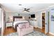 Cozy bedroom featuring a stylish bed with plush pillows and modern decor accents at 509 Queensferry Rd, Cary, NC 27511