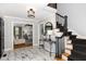 Bright foyer with marble floors, staircase, and an open view to the living room at 509 Queensferry Rd, Cary, NC 27511