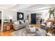 Bright living room with unique sliding barn door and modern decor at 509 Queensferry Rd, Cary, NC 27511