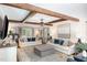 Cozy living room with beamed ceilings, shiplap wall detail, and plush seating at 509 Queensferry Rd, Cary, NC 27511