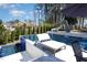 The backyard features a pool with a jacuzzi, a slide, and chaise lounges at 509 Queensferry Rd, Cary, NC 27511