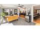 Cozy sun room with a view to the kitchen, dining, and outdoors at 509 Queensferry Rd, Cary, NC 27511