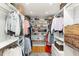 Spacious walk-in closet with custom shelving and storage for clothes and accessories at 509 Queensferry Rd, Cary, NC 27511