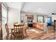 Bright open kitchen featuring wood cabinets, stainless steel appliances and eat in dining area at 513 S Cheatham St, Franklinton, NC 27525