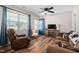 Inviting living room features hardwood floors, comfortable seating, and a cozy fireplace at 513 S Cheatham St, Franklinton, NC 27525